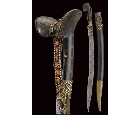 dating: 19th Century provenance: Turkey Curved blade with a thin groove at the back; silver grip, decorated with cabochon cor