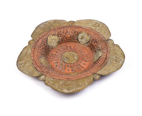 dating: 19th Century provenance: Tibet Copper body decorated with bas-relieved floral motifs and enriched with six brass shie