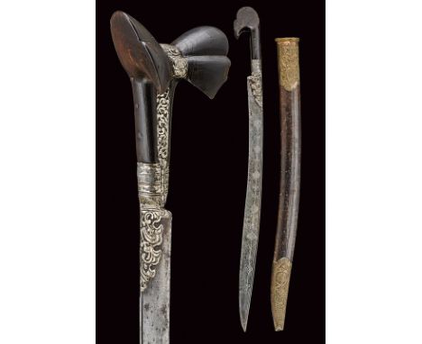 dating: 19th Century provenance: Turkey Curved, single-edged blade with a groove at the back, decorated with Arabic writings 