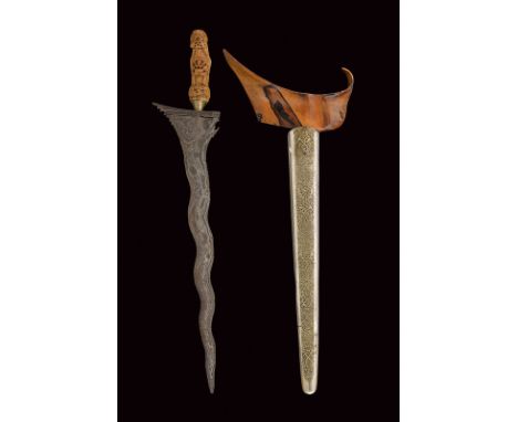 dating: late 19th Century provenance: Madura Island Undulated, fine pamor blade of lenticular section, with small spikes at t