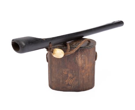 dating: late 19th Century provenance: Japan Black, wooden pipe case with opening for the pipe. Oval, wooden inro, held by a f