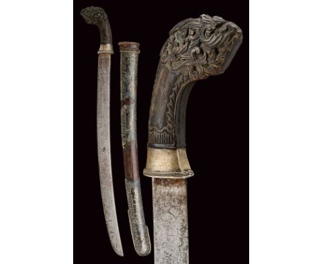 dating: 19th Century provenance: Giava Curved, single-edged blade; silver ring nut, curved, wooden grip carved with floral mo