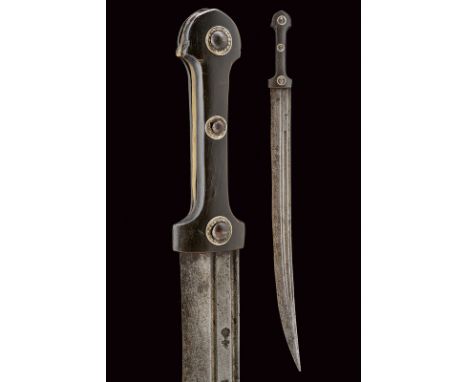 dating: 19th Century provenance: Caucasia Long, curved, single-edged blade, with elongated tip (a small part missing), provid