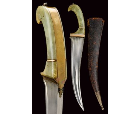 dating: 19th Century provenance: Indopersia Wide, curved, "T"-back, single-and false-edged blade with slightly strengthened t