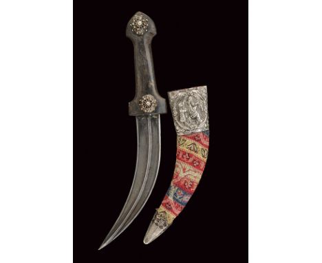 dating: circa 1900 provenance: Iran Curved, double-edged blade, with fuller at the centre; horn grip decorated with silver, f