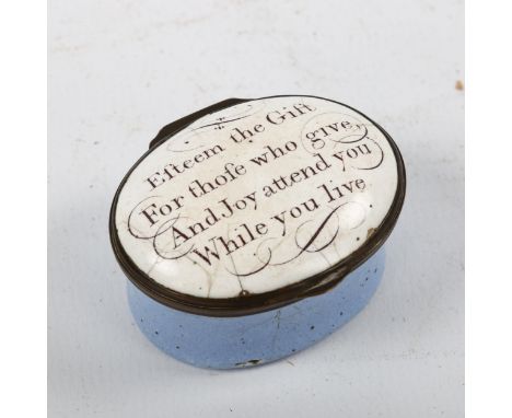 A Georgian enamel patch box of oval form, with inscription to the lid Esteem the gift for those who give, and joy attend you 
