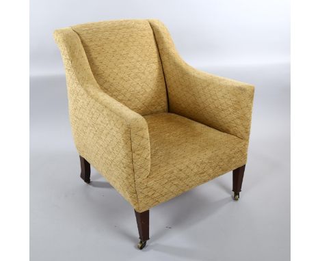 Howard & Son upholstered armchair, on tapered legs with brass casters, stamped on back leg serial no. 19473313, recently upho