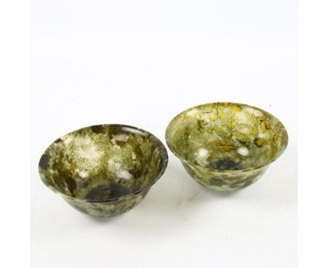 A pair of Chinese Spinach Jade bowls, diameter 10cm 