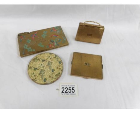 4 Vintage compacts including mascot musical case, lighter cigarette case etc.,