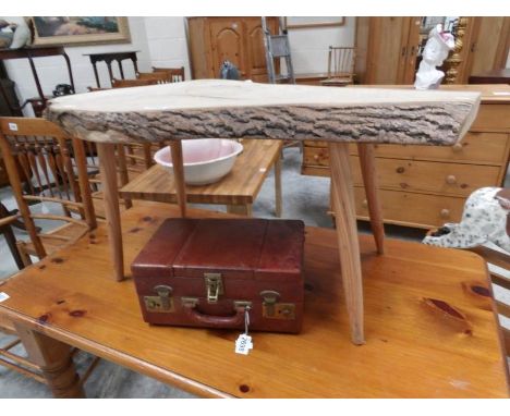 A 'tree trunk' coffee table.