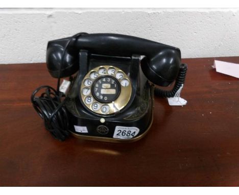 A vintage dial telephone.