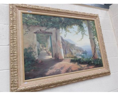 A large framed continental scene print.
