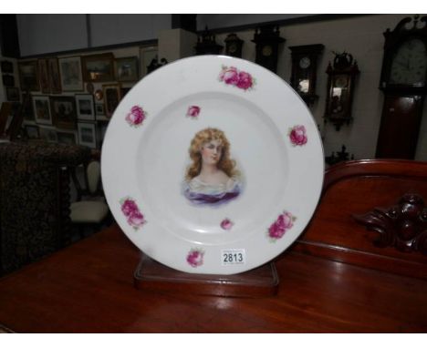 A 19th century continental porcelain portrait plate.