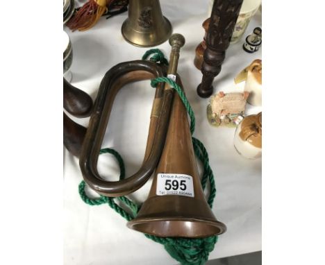 An early 20th century Boosey and Hawkes Ltd., bugle.