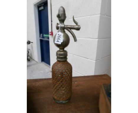 A vintage soda syphon.