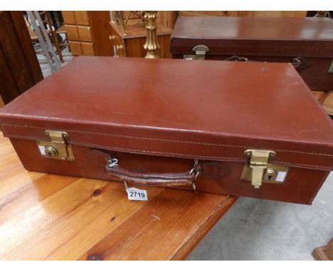 A vintage leather suitcase.