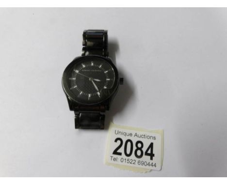 An Armani Exchange gents wrist watch, second sweep, in working order.