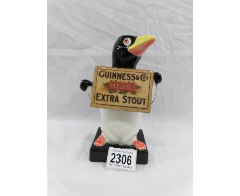 An original Carlton ware Guinness penguin table lamp base.