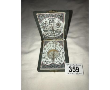 A good quality 20th century compass and a copy of a early 19th century compass.