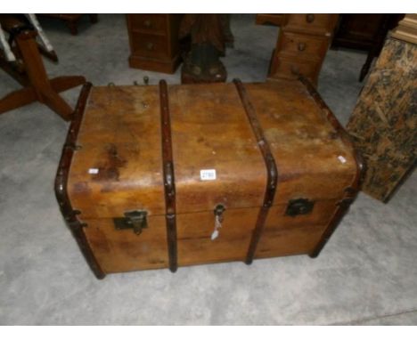 A large old cabin trunk.