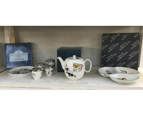 A Royal Worcester boxed teapot, boxed triple dish, boxed shortbread tray and 4 egg coddlers