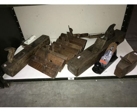 A shelf of wood working planes.