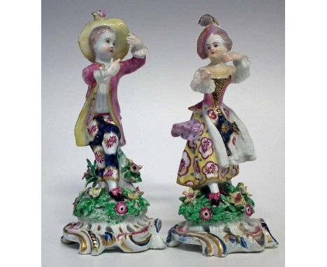 Pair of Bow figures circa 1765, modelled as a girl and boy dancing on scrolled bases, (2) 19cm high    Condition report:   Bo