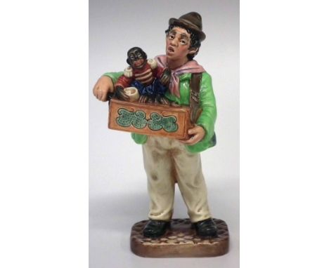 Royal Doulton figure of the Organ Grinder, HN. 2173, 22cm high     Condition report: No damage, restoration or crazing.