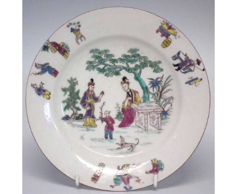 Bow plate circa 1765, outline printed and enamelled with figures within a garden, 20.5cm diameter     Condition report: No da