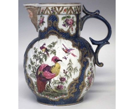 Large Samson Paris mask jug in the style of first period Worcester, painted with exotic birds on a blue scale ground, hatched