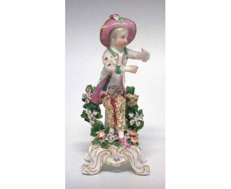 Bow figure of a boy circa 1765, modelled dancing on a scrolled base, anchor and dagger mark to base, 18.5cm high     Conditio