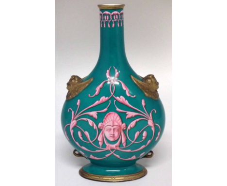 Royal Worcester vase signed Callowhill, painted with raised pink scrollwork and mask on green ground, gilded winged cherub ha
