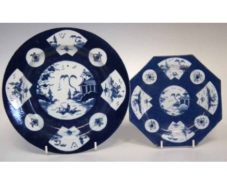 Two Bow plates circa 1760, painted with landscapes within powder blue grounds, pseudo oriental marks to bases, (2) the larges