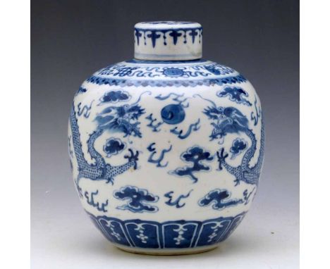 Chinese blue and white globular vase and cover, 19th century, painted with dragons pursuing the flaming pearl, height 21.5cm.