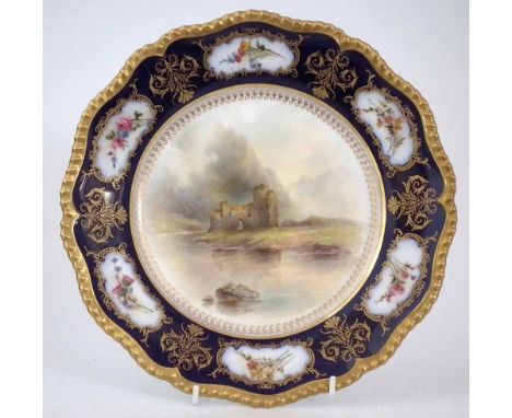 Royal Worcester plate signed J. Stinton,   painted with Inverlochy Castle with blue floral border, printed marks and 1914 dat