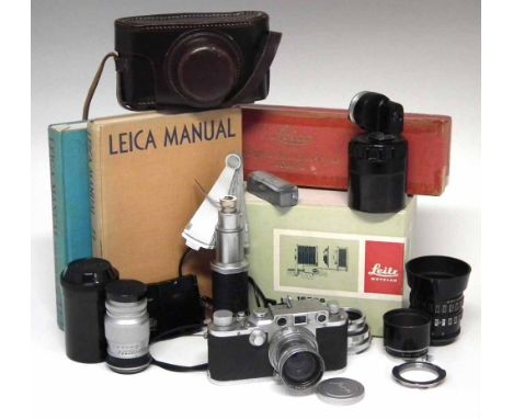 Leica Outfit  to include a IIIC camera serial No.372618 fitted with F2 Summitar lens and English made leather case, a collaps