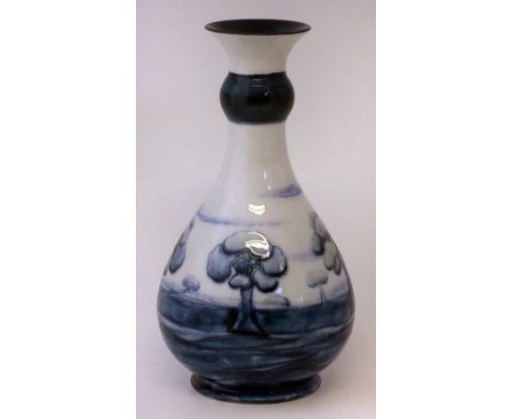 AMENDED CONDITION REPORT  Unusual Moorcroft Florian vase circa 1904, decorated with White Hazledene pattern probably for the 