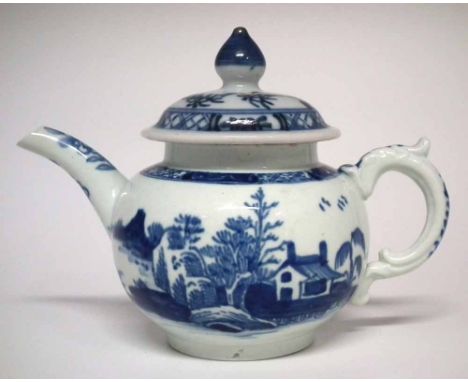 Vauxhall teapot base circa 1755, with scroll moulded handle, painted in underglaze blue with a landscape together with a non-