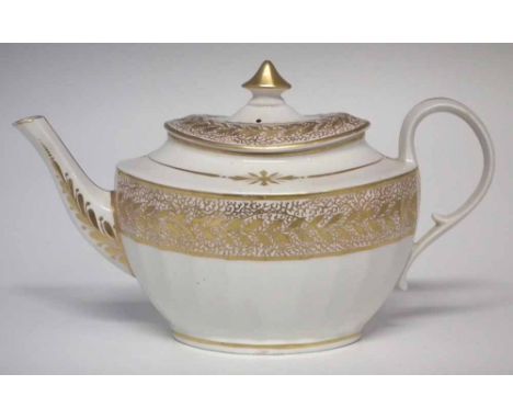 Pinxton teapot circa 1810, decorated in gilt with 'seaweed' pattern 1 on a shallow fluted body, (2) 14cm high     Condition r