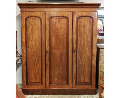 WARDROBE, 185cm W x 208cm H x 56cm D, Victorian mahogany triple fronted enclosing sliding trays, drawers and hanging space. 