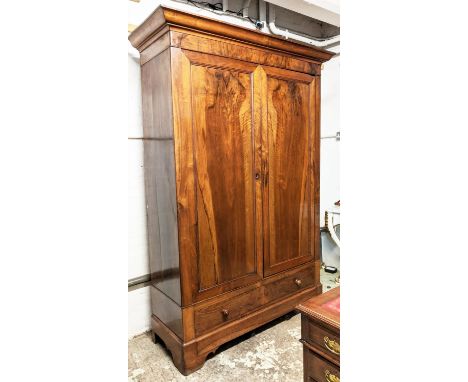 ARMOIRE, 152cm W x 217cm H x 57cm D, circa 1870, Continental walnut with two panelled doors enclosing a hanging rail above tw