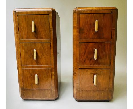 ART DECO BEDSIDE CHESTS, a pair figured walnut each with three drawers and original silver/marble handles, 32cm x 45cm D x 72