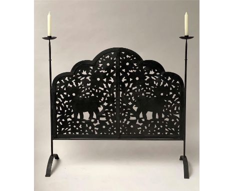 ELEPHANT FENDER, wrought iron with candlestick standards and elephants pierced panel, 97cm x 94cm H 