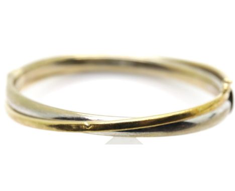 Italian yellow and white gold bangle, 12.2g, 6 x 5.25 cm approximately. P&amp;P Group 1 (£14+VAT for the first lot and £1+VAT