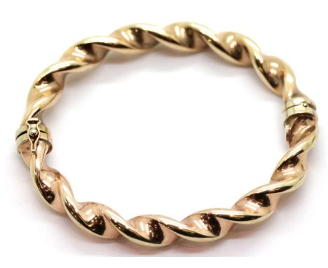 9ct rose gold twist bangle with magnetic fastening, 12.3g. P&amp;P Group 1 (£14+VAT for the first lot and £1+VAT for subseque