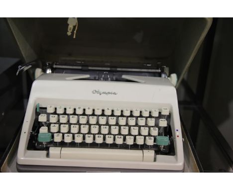 Cased Olympia vintage typewriter, This lot is not available for in-house P&amp;P. 