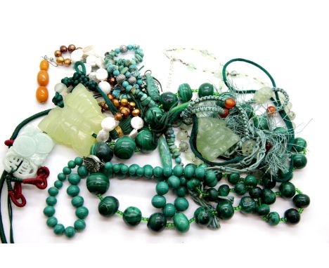 Selection of jade type, malachite, pearl and turquoise necklaces, with a single butterscotch amber earring. P&amp;P Group 1 (