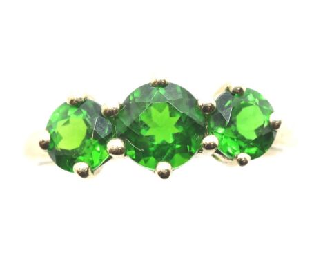 9ct gold dress ring set with a trio of green stones, size K/L, 1.7g. P&amp;P Group 1 (£14+VAT for the first lot and £1+VAT fo