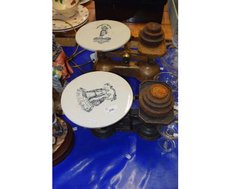 Two pairs of vintage kitchen scales with weights