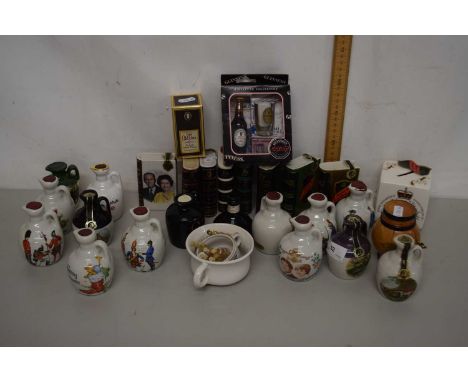 A collection of various miniature novelty ceramic Whisky bottles to include many royalty issues